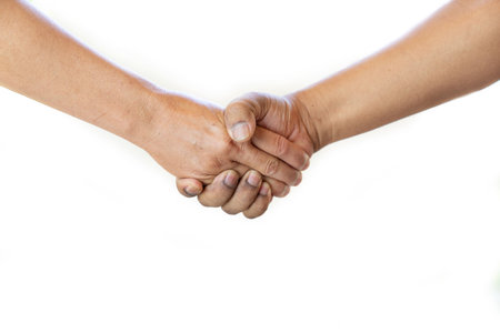 Close up shaking hands and phrase Together. Concept of friendship. Isolate white background.の写真素材