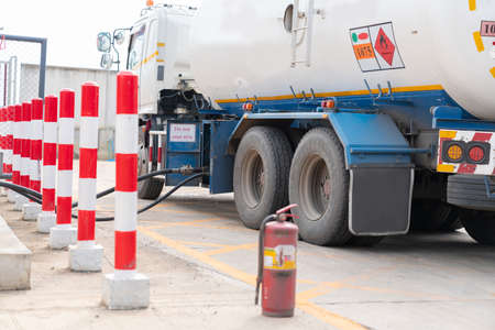 Tanker Transeferring Gas into gas station. safety for load out.の写真素材