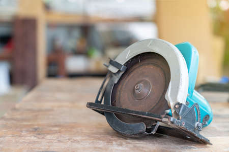 Close-up  circular saw place on a wooden table in the workshop. DIY conceptの写真素材