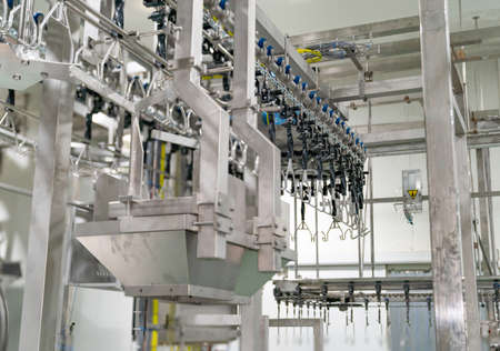 Emtry chicken hang on jack conveyor in meat process. Cleannig after used.の写真素材