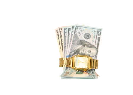 Golden watch hold dollar bills isolate on white background. Concept of time to money, retirement saving.の写真素材
