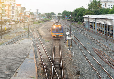 The train come on track in railway station to transport passenger.の写真素材