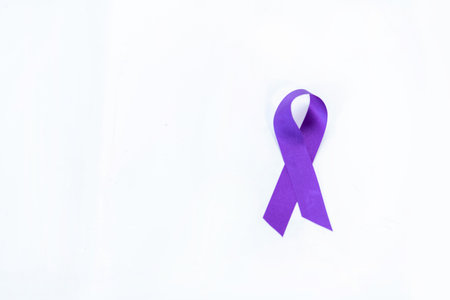 Purple ribbon on isolate white background. Concept of world cancer day.の写真素材