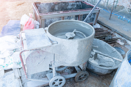 Mini mixer mortar mixing of dry building in construction site.の写真素材