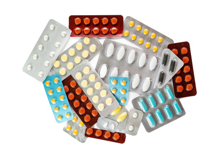Many tablet in blister pack show medicine concept isolate on white background.の写真素材