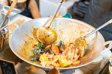 Stir fired seafood with curry. Thai famaous traditional and original spicy.の写真素材