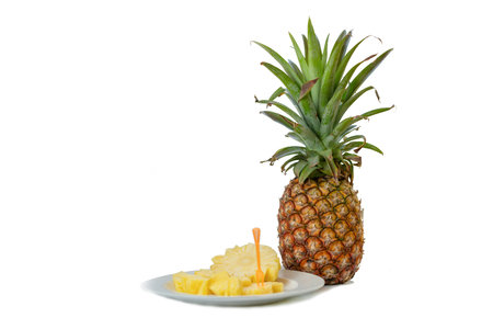 Fresh and delicious pineapple fruit slice platte isolate on white background.の写真素材