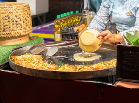 Fried clams crispy with omelet is delicious on street food market.の写真素材