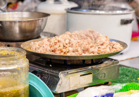 Steamed crab roe in steamer with sea food sauce in glass jar on street food market.の写真素材
