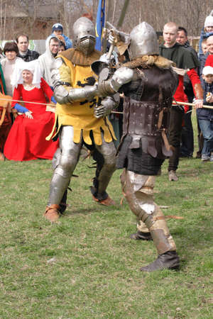Danzig, Poland - April 16, 2011 - A staging of knightâs tourney. Two knights in the course of fight.のeditorial素材