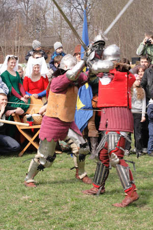 Danzig, Poland - April 16, 2011 - A staging of knightâs tourney. Two knights in the course of fight.のeditorial素材