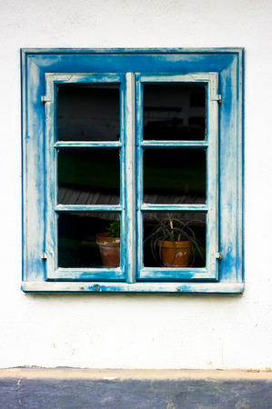 An old window on a historic building.の写真素材