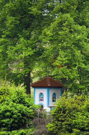 Newly restored old chapel. Old tiny sacral building. Folk architecture. South Moravia, Czech Republic.の写真素材