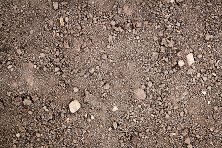 The rounded rock texture background in foreign but familiar have unity ground の写真素材