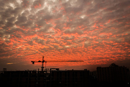 silhouette construction when sun nears go down の写真素材