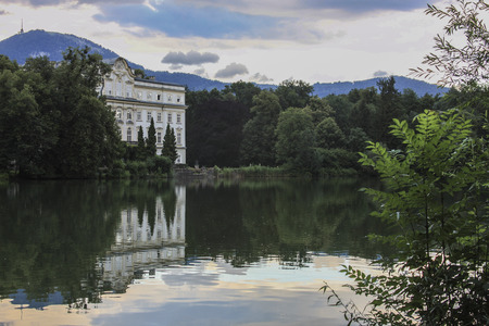 Salzburg, Austria: July, 6, 2009; Schloss Leopoldskron, Von Trapp mansion from the movie in the Sound of Music, beautiful reflection of mansion from the rear overlooking a pond where they sang My Favorite Things. Editorial use.のeditorial素材