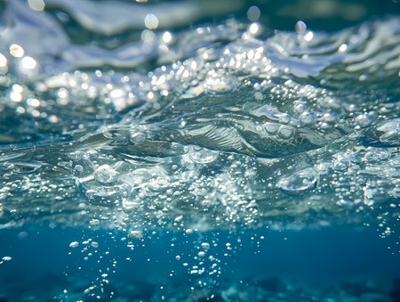 Water surface with ripples and bubbles close-up. Abstract backgroundの素材