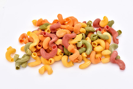 Macaroni on a white background. Products from flour. Varied macaroni. Isolated pasta.の写真素材