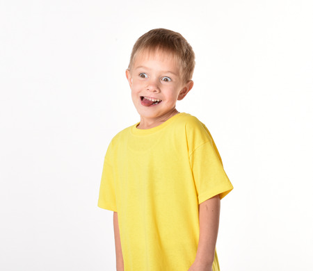 The boy is happy. The child is surprised. A child is happy. An amazing boyの写真素材