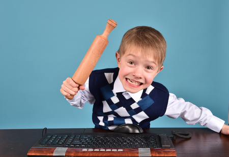 Bad behavior. The man is angry.Aggressive child.の写真素材