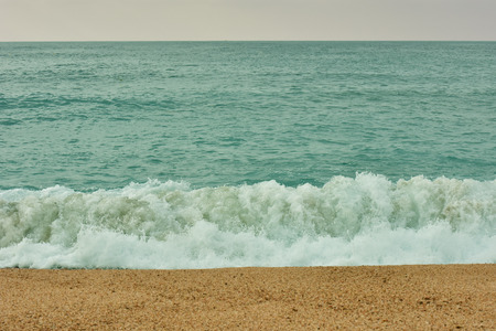 Coast of the Mediterranean Sea.Sand beach.Sea waves.の写真素材