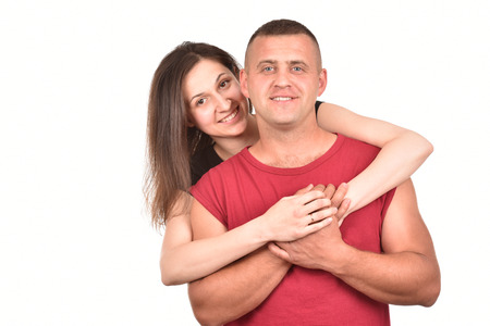 Young family on a white background. Perfect pair. A good relationship. Strong friendship.の写真素材