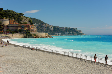 The beach of the city of Nice. Rest on the sea.の写真素材