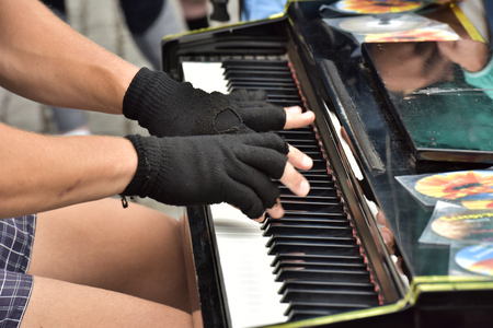 Czech Republic Prague June 29, 2018. A street musician plays the piano.のeditorial素材