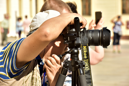 Czech Republic Prague June 26, 2018. Photographer on a city street.のeditorial素材