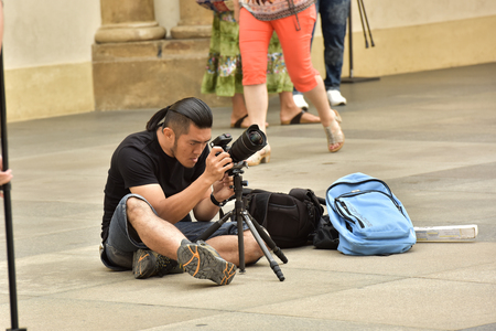 Czech Republic Prague 26 June. Photographer on the streets of the city.のeditorial素材