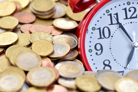 Time to make money. Alarm clock and euro.の写真素材