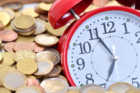 Time to make money. Alarm clock and euro.の写真素材