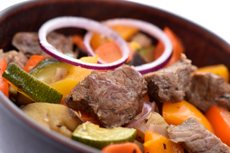 Beef stew with potatoes, carrots and sweet peppers.の写真素材