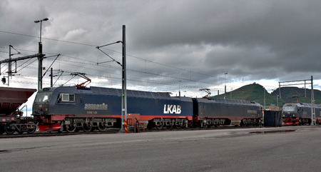 SWEDEN, KIRUNA  - FEBRUARY 10, 2012: Freight train of LKAB company carrying iron ore from mining town Kiruna situated beyond the polar circle.のeditorial素材