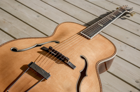 Beautiful antique acoustic guitarの写真素材