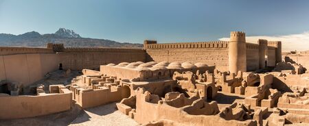 Panoramic view of an adobe castle Rayen close to the town Kerman under mountain Haraz, Iranの写真素材