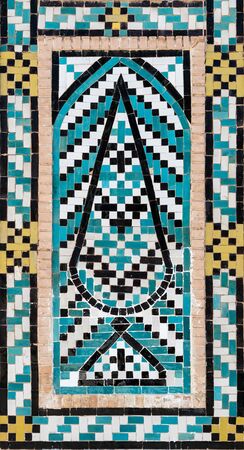 Beautiful decorative turquoise blue tiled mosaic with tree motif, Shah Nematollah Vali Shrine, Iranの写真素材