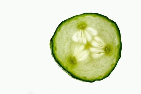 Cucumber slice isolatedの写真素材