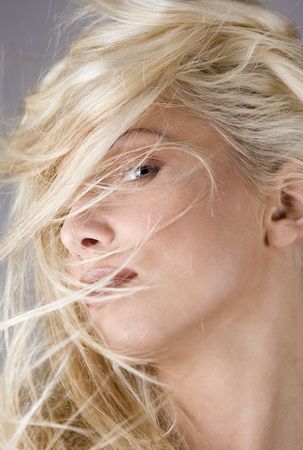 healthy beautiful long hair in motion created by wind, fashion look  の写真素材