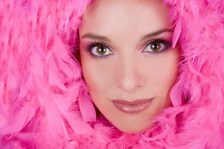 pretty model with bright makeup wearing pink boaの写真素材