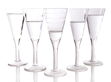 beautiful glasses filled with water on white backgroundの写真素材