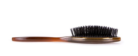 object brown hair brush on white isolated backgroundの写真素材
