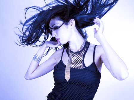 sexy pretty woman having fun in the windの写真素材