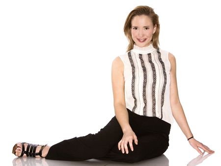 pretty redhead woman wearing black pants and topの写真素材
