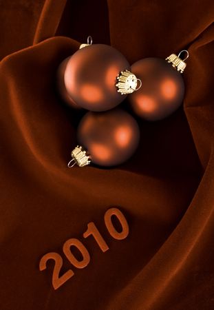 beautiful red ornaments on dark red velvet backgroundの写真素材