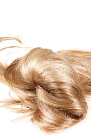 human blonde hair on white isolated backgroundの写真素材