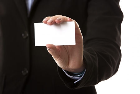 business woman in her 40s holding business cardの写真素材