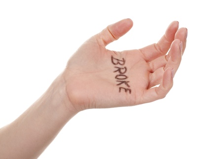 female hand on white isolated background with written messageの写真素材