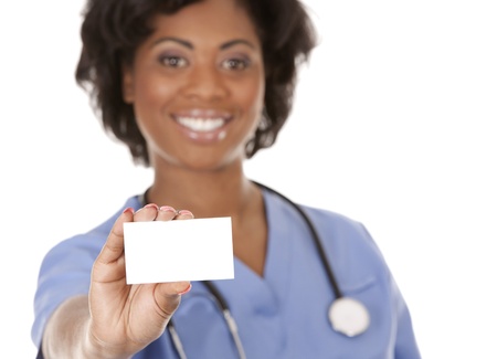 black nurse wearing scrubs on white isolated backgroundの写真素材