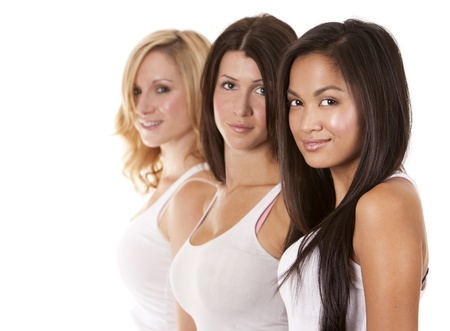 beautiful three women having fun on white backgroundの写真素材